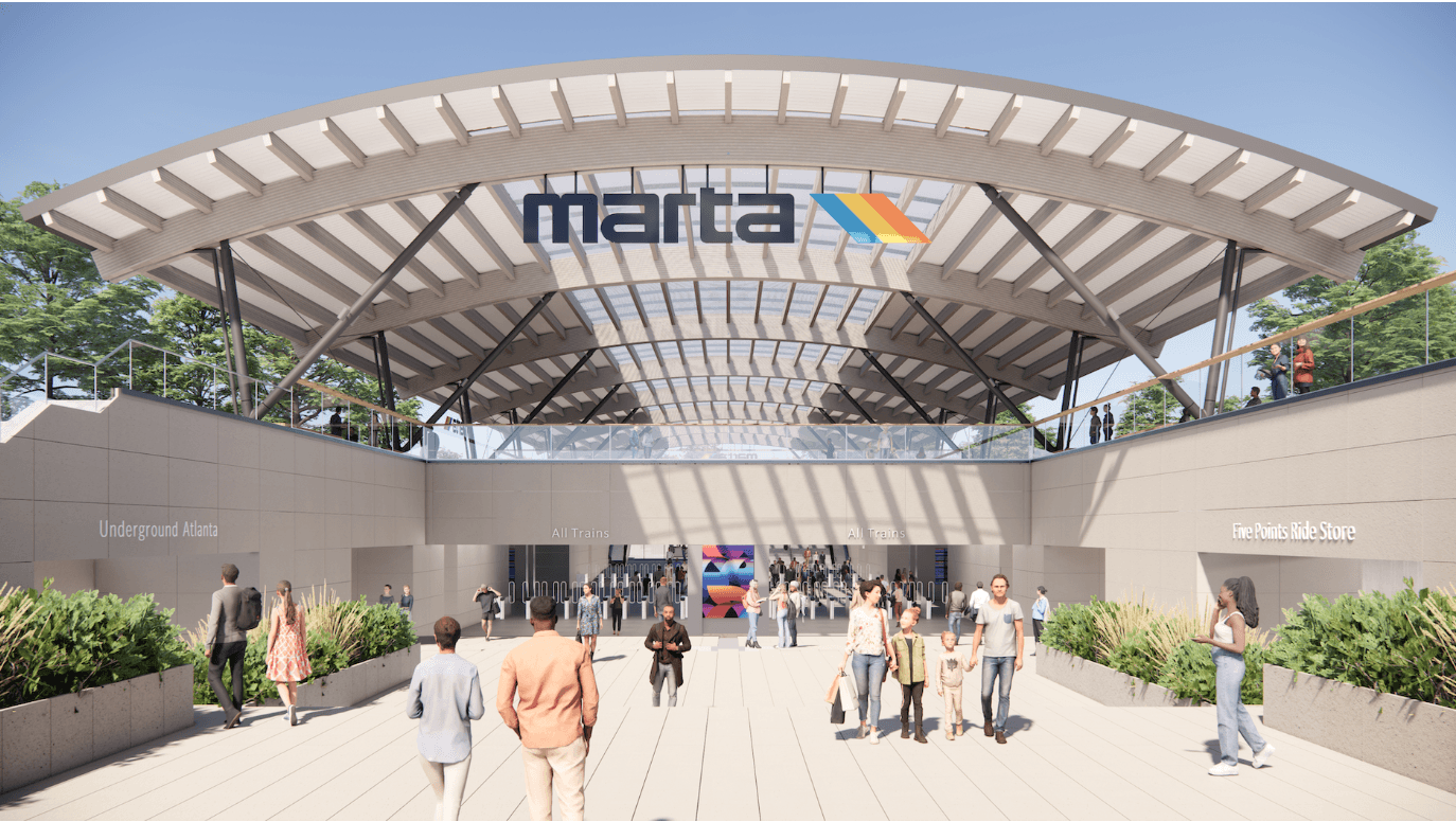 people on the train platform waiting to get on